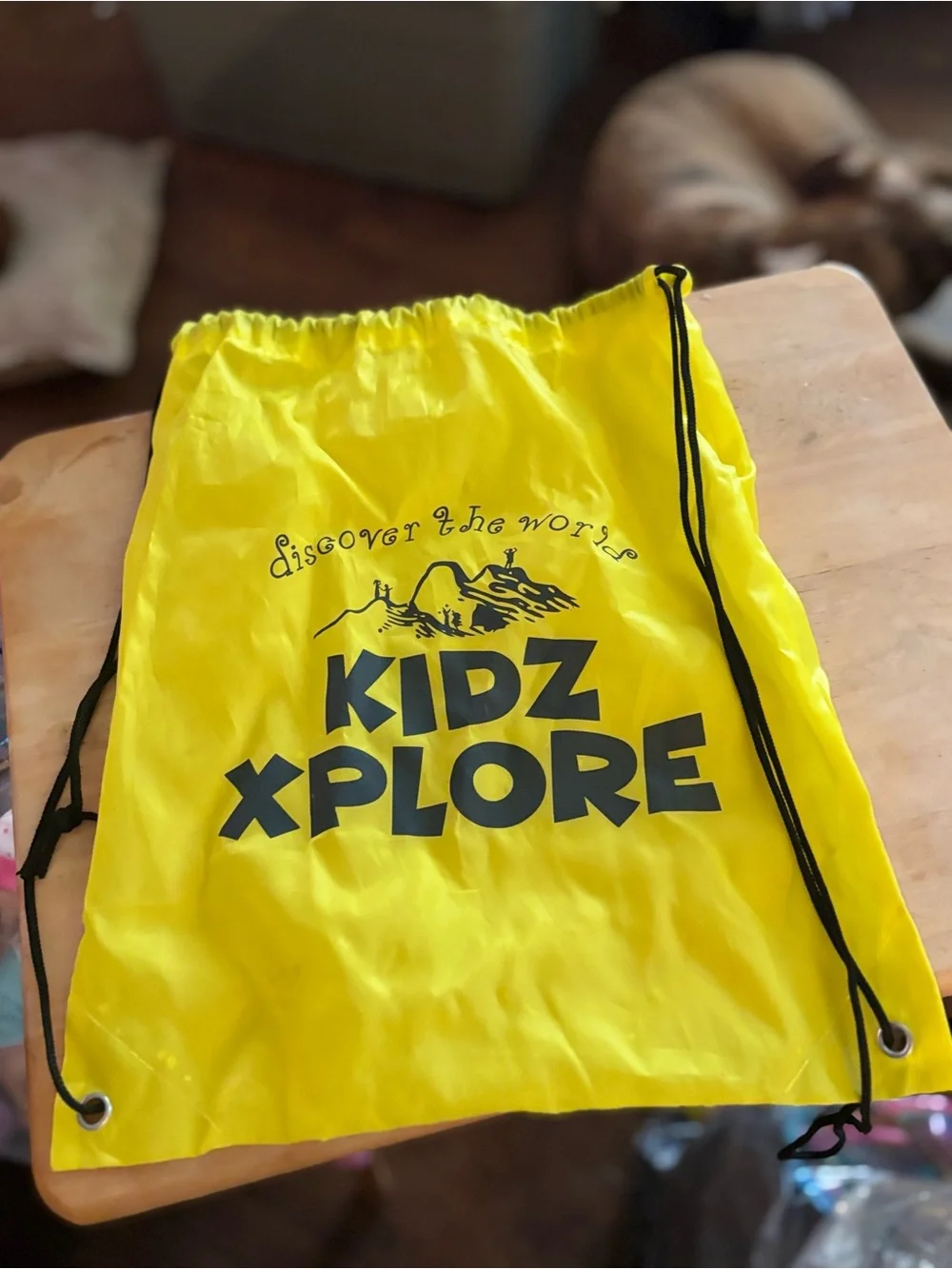 Yellow Kidz Xplore drawstring bag with mountain graphic